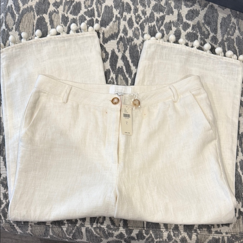 Chic Cream Pants with Pom-Pom Hem